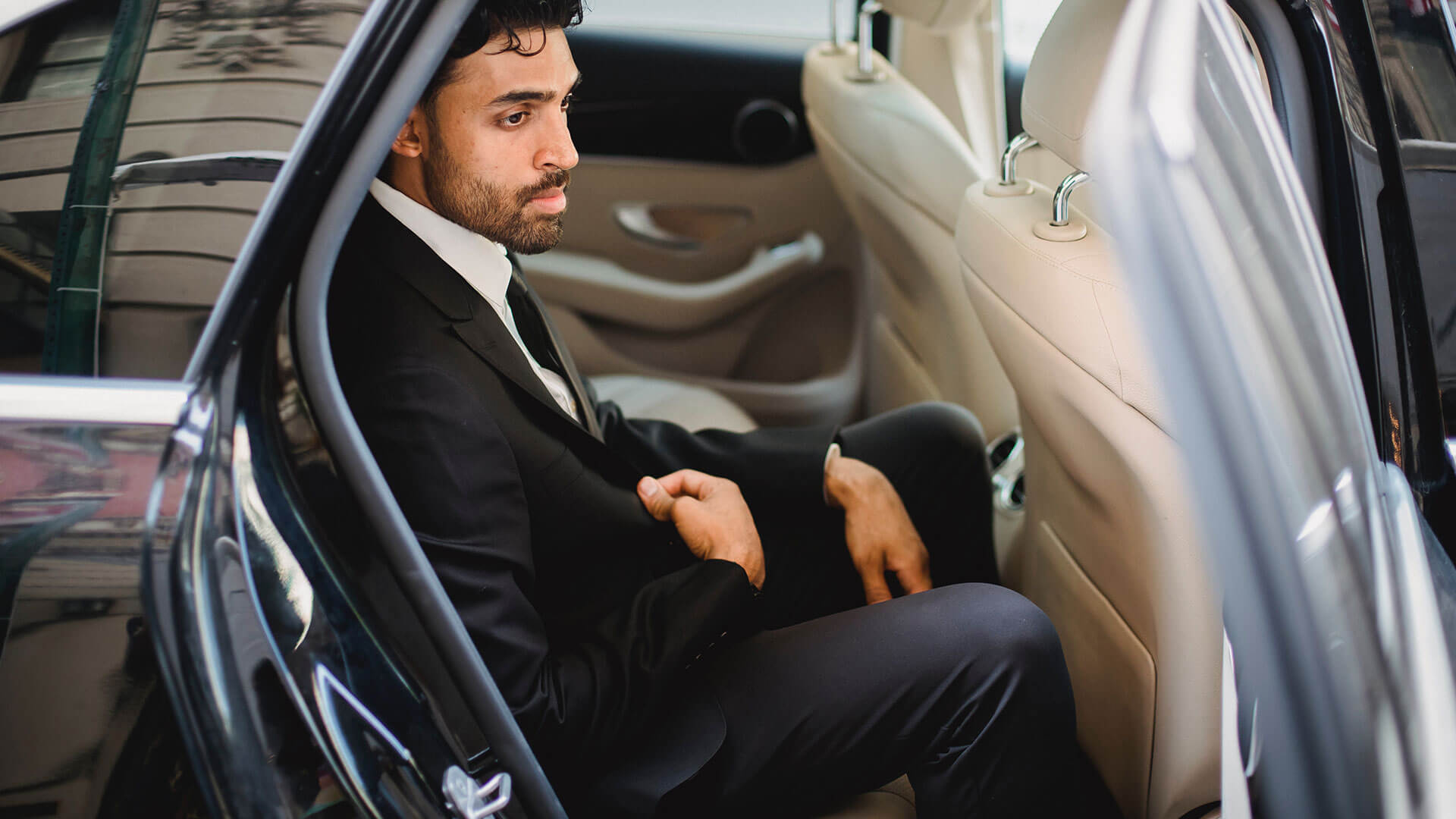 Person in a mercedes car